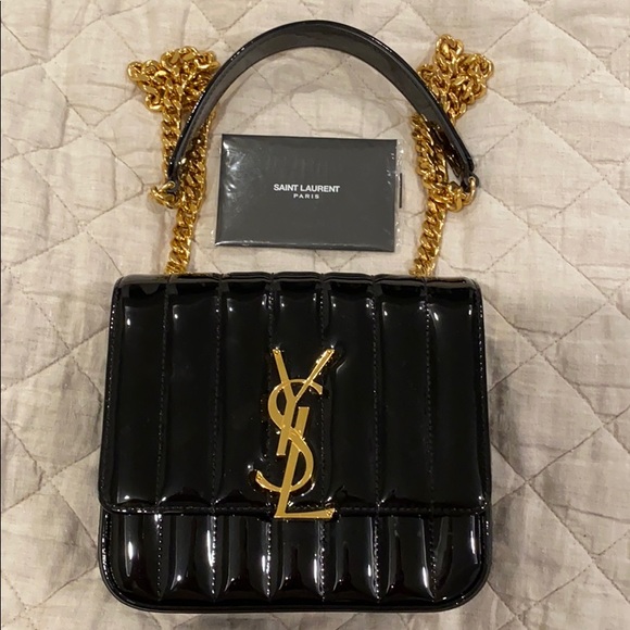 Yves Saint Laurent Handbags - Yves Saint Laurent Black and Gold Shoulder Bag